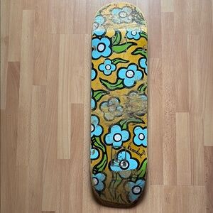 Krooked Skateboard Deck with Blue Flowers